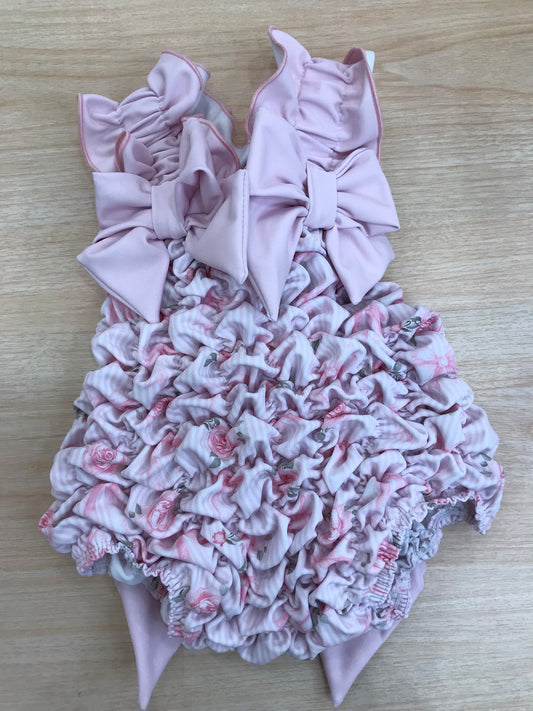 Costume Fofettes con fiorellino rosa e fiocchi sul davanti e sul retro