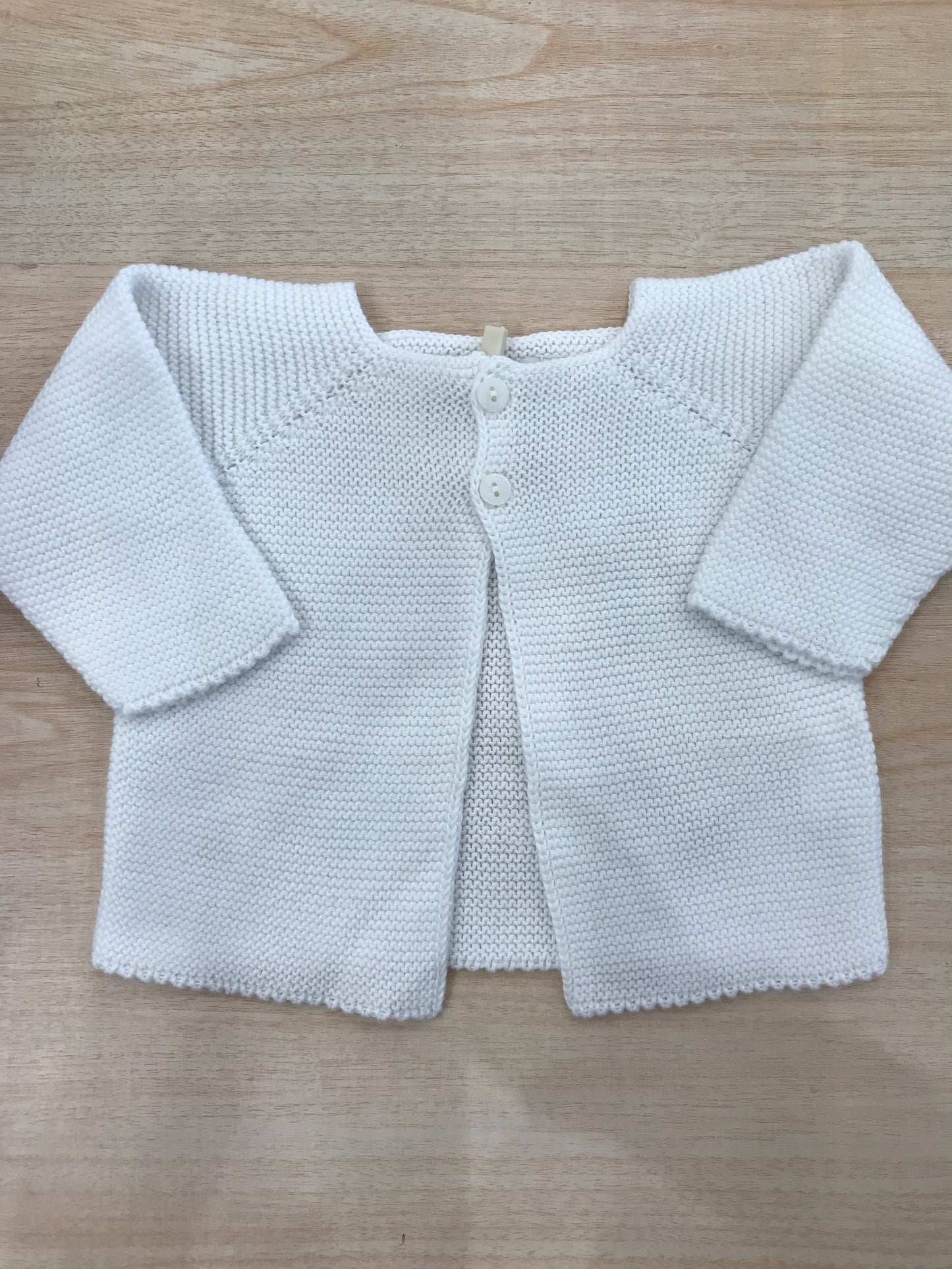 Cardigan PCS bianca manica lunga con due piccoli bottoni sul davanti