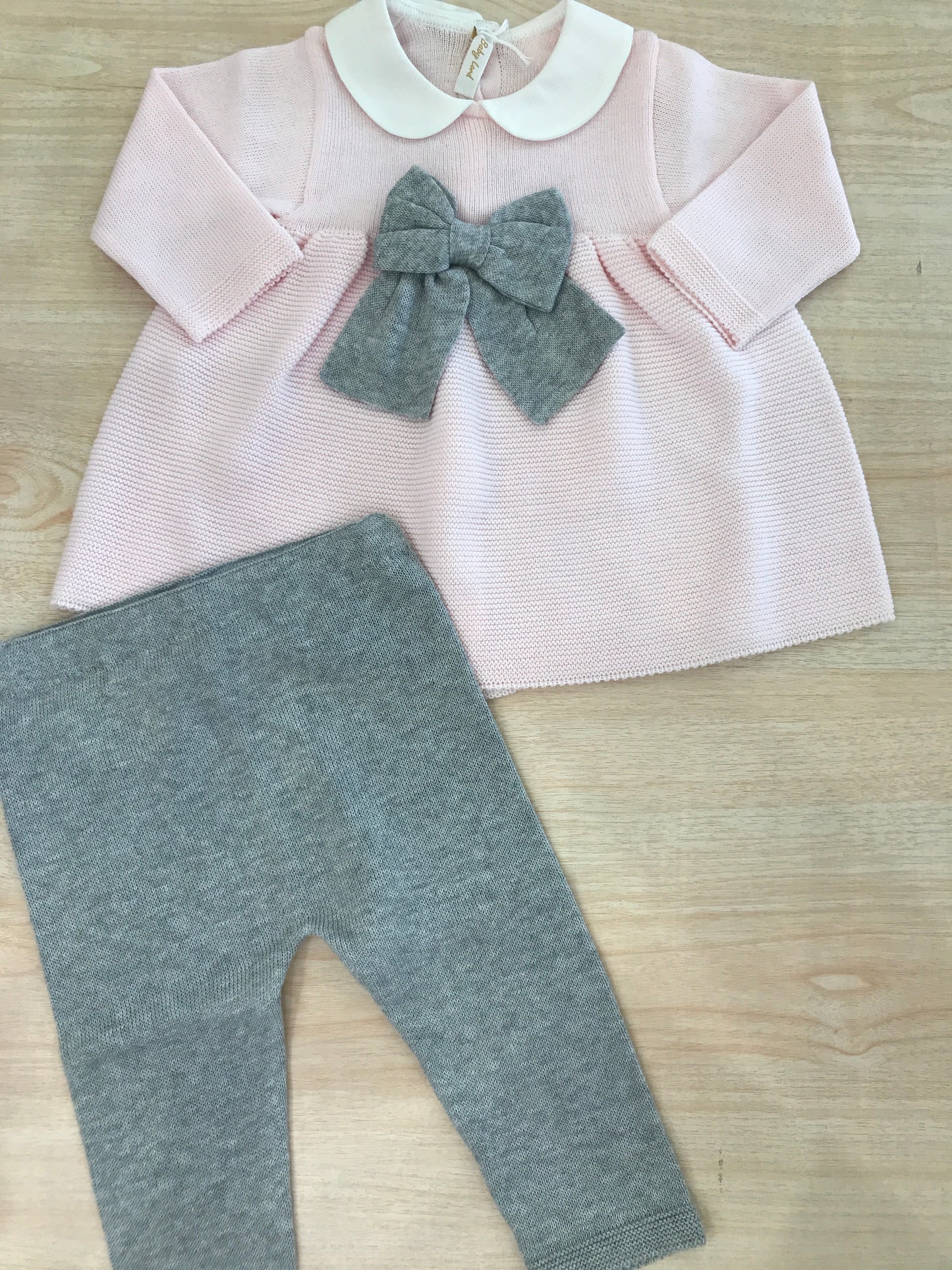 Tutina Baby Lord in filo duepezzi rosa e grigio con fiocco centrale in grigio