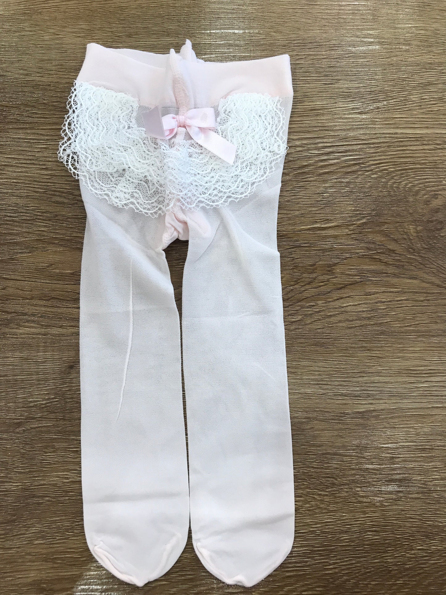 Calze Story Loris in microrete con rusche bianca e fiocchetto rosa sul retro
