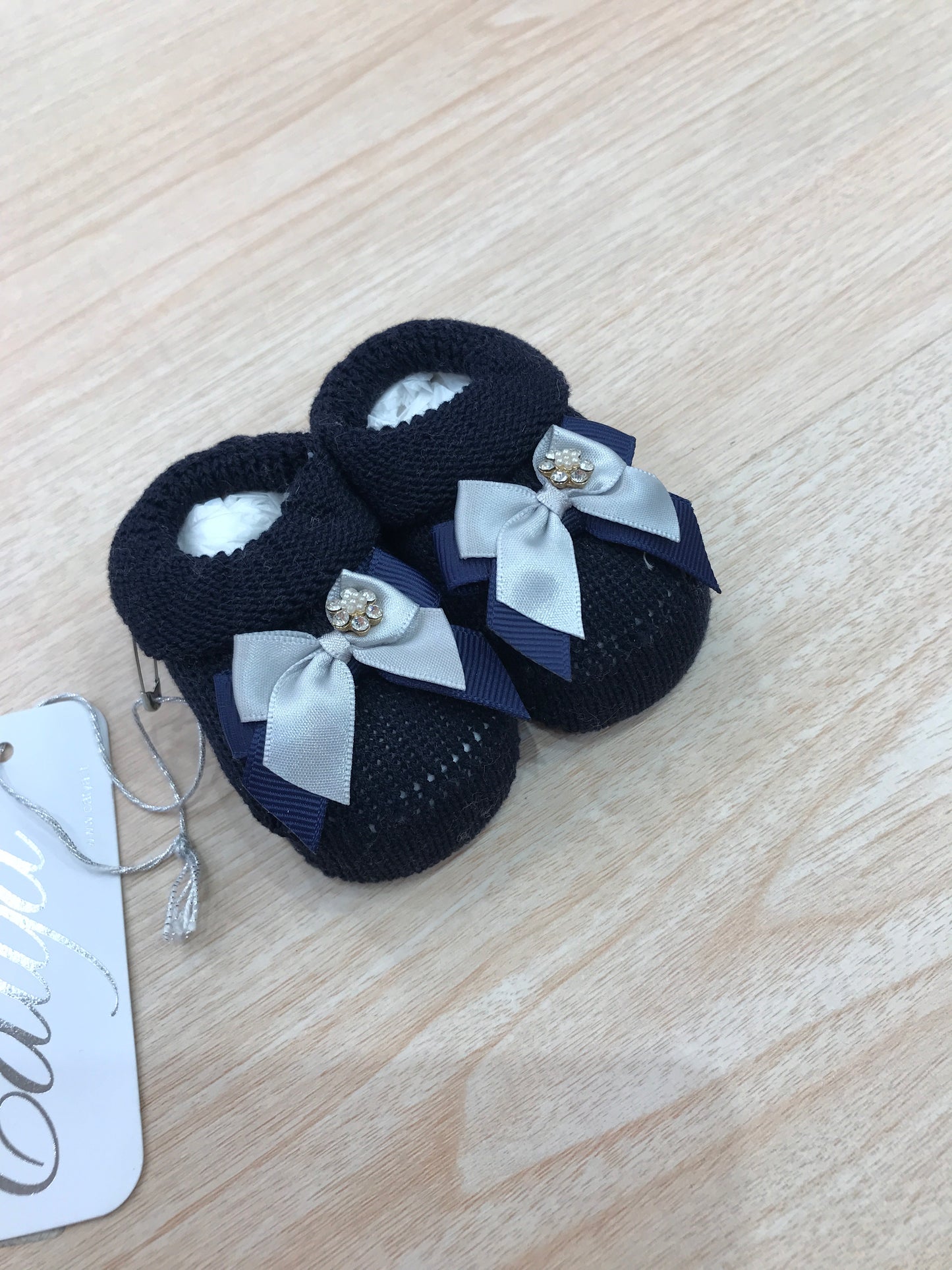 Babbucce Catya in filo blu scuro con doppio fiocchetto sul davanti e margherita