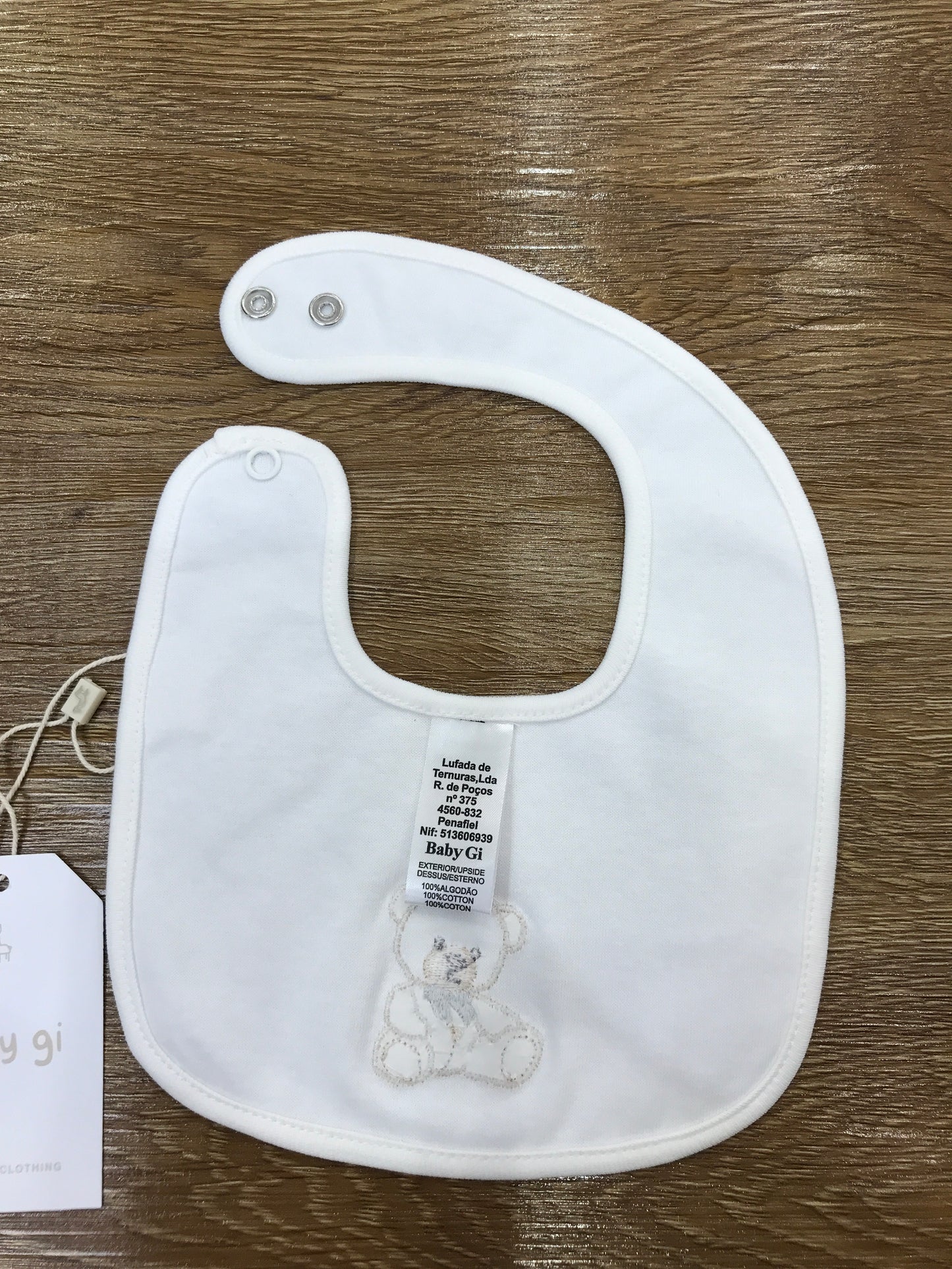 Bavetta Baby Gi in cotone panna con orsetto sul davanti