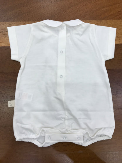 Pagliaccetto Baby Gi in cotone panna corto mezza manica con collo tondo con orsetto centrale sul davanti con fiocchetto