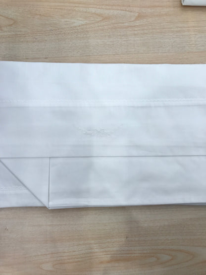 Lenzuola Baby Gi in cotone completo sotto con elastico sopra e federa rifinito con pois e fiocchetto bianco