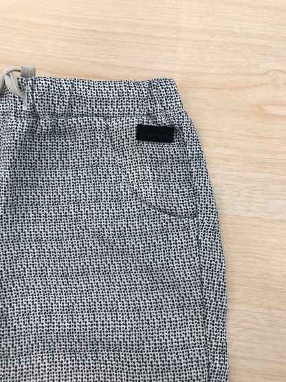 Pantalone Nanan in cotone blu scuro e panna con elastico in vita