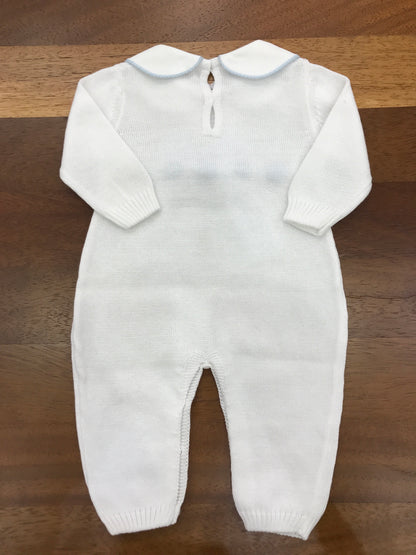 Tutina Baby Lord in filo bianco manica lunga con collo tondo rifinito in celeste con fiocco applicato sul centro con passanastro
