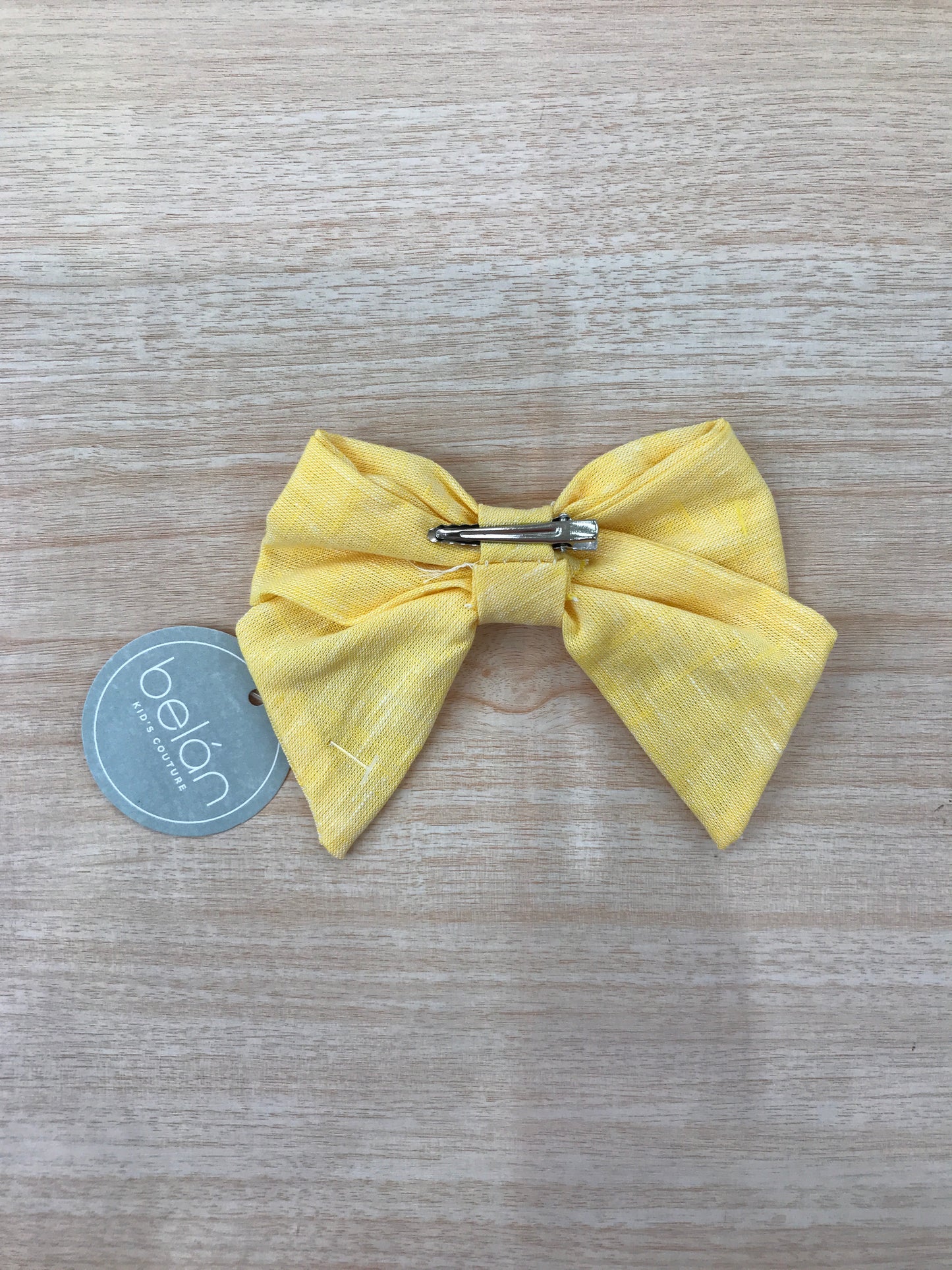 Fermaglio Belan in cotone fiocchetto giallo