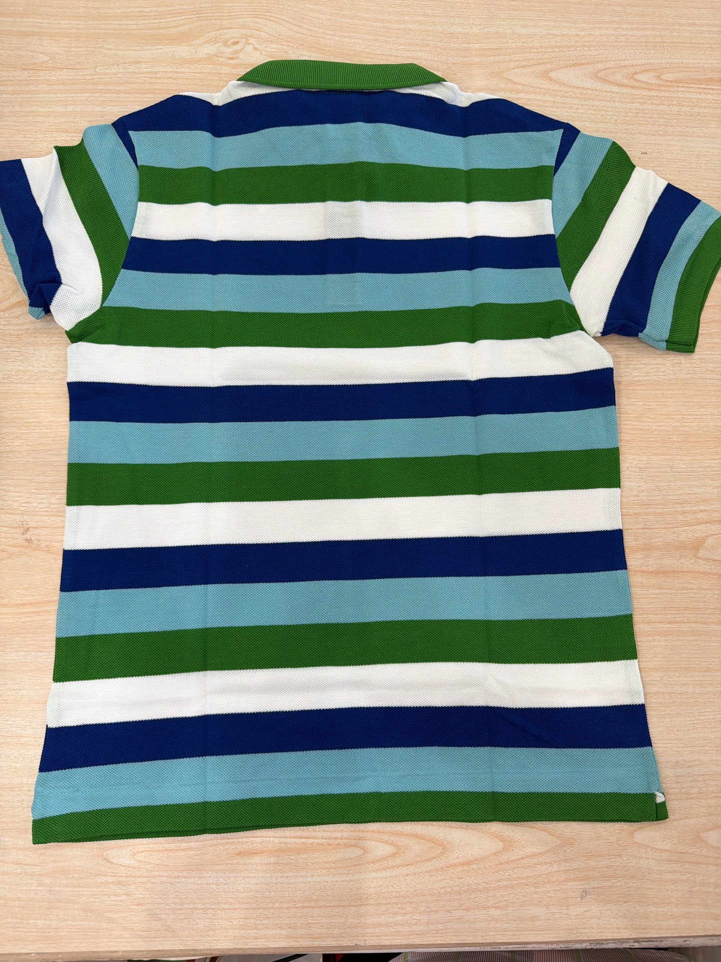 Polo Lacoste in cotone mezza manica con bottoncini e logo ricamato lateralmente unisex