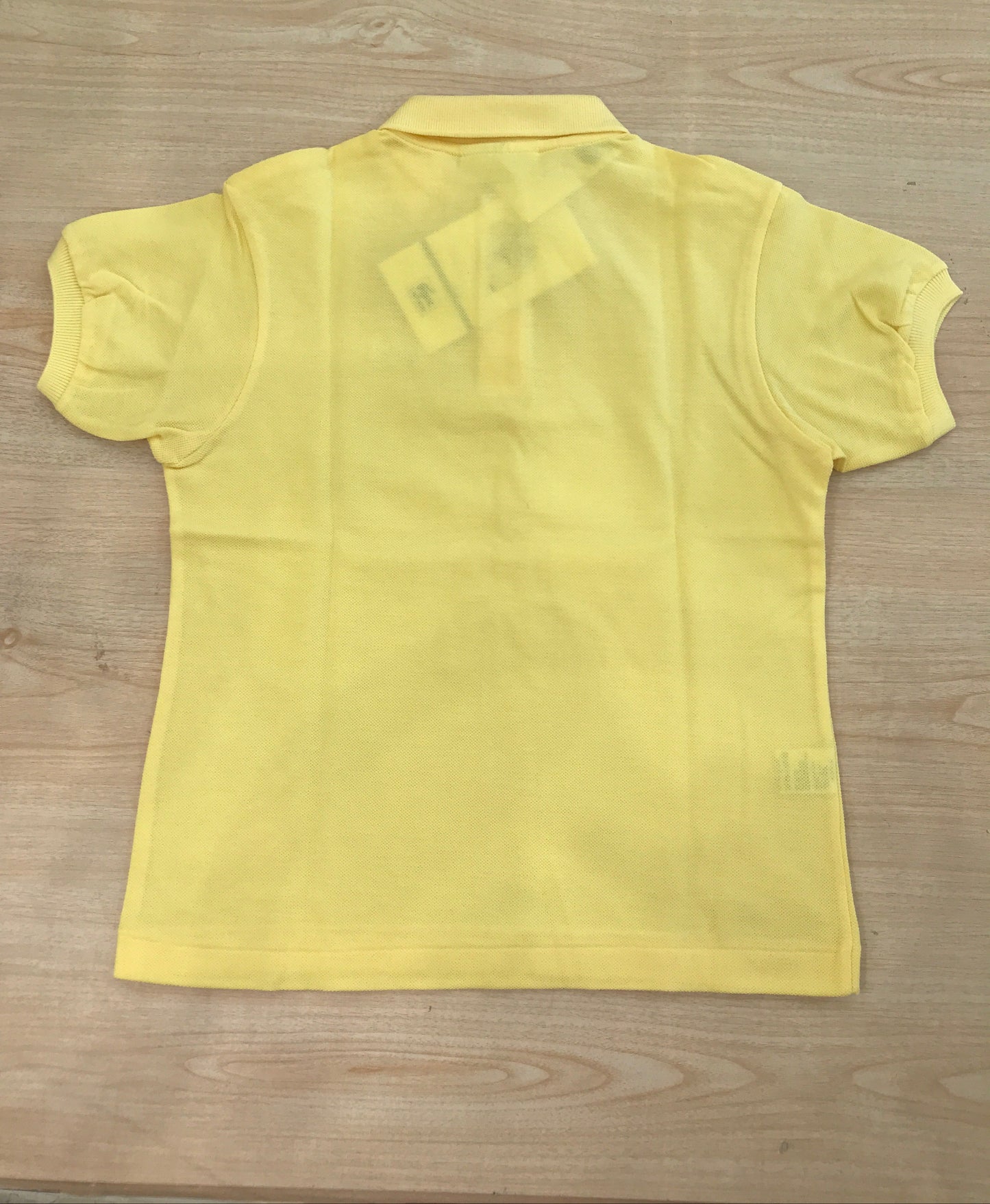 Polo Lacoste in cotone mezza manica con bottoncini e logo ricamato lateralmente unisex