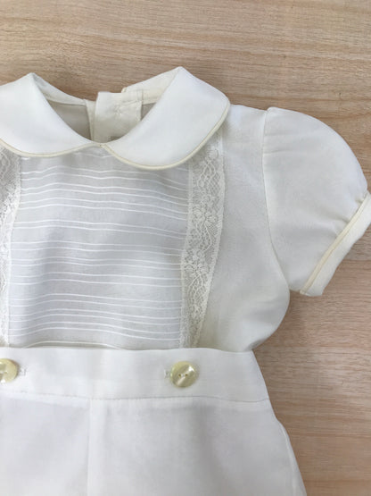 Pagliaccetto Belan in cotone con organza mezza manica a sbuffo con righe sul davanti e ai lati applicazioni in pizzo