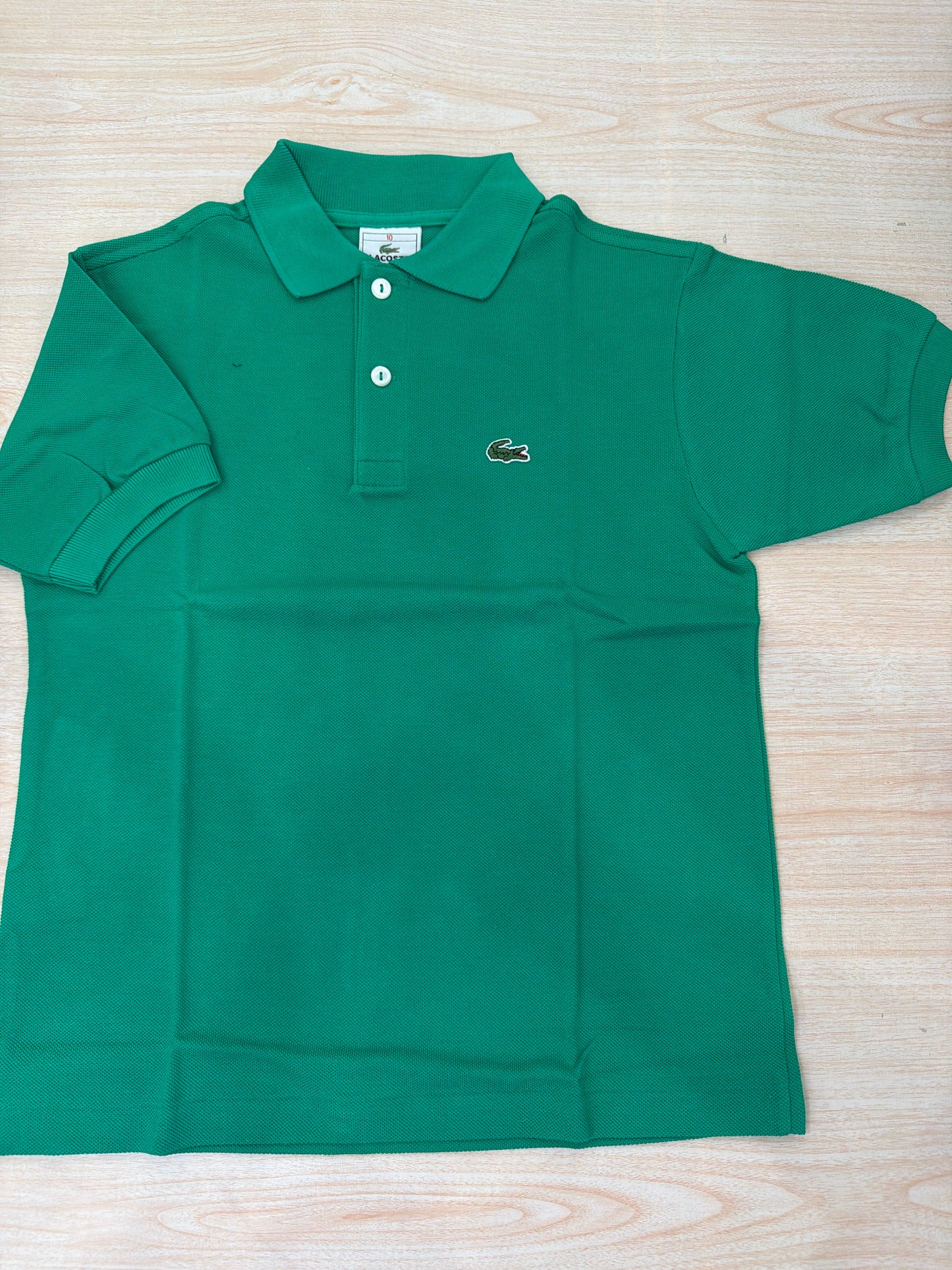 Polo Lacoste in cotone mezza manica con bottoncini e logo ricamato lateralmente unisex