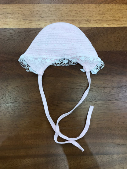 Cuffia Paz Rodriguez in filo rosa con lavorazione con pois bianchi con merletto ricamato al bordo