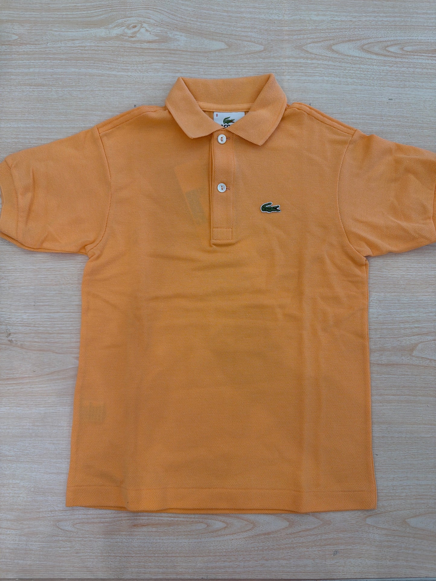 Polo Lacoste in cotone mezza manica con bottoncini e logo ricamato lateralmente unisex