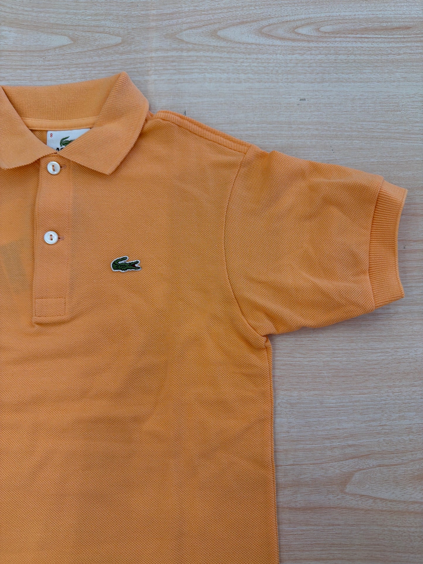 Polo Lacoste in cotone mezza manica con bottoncini e logo ricamato lateralmente unisex