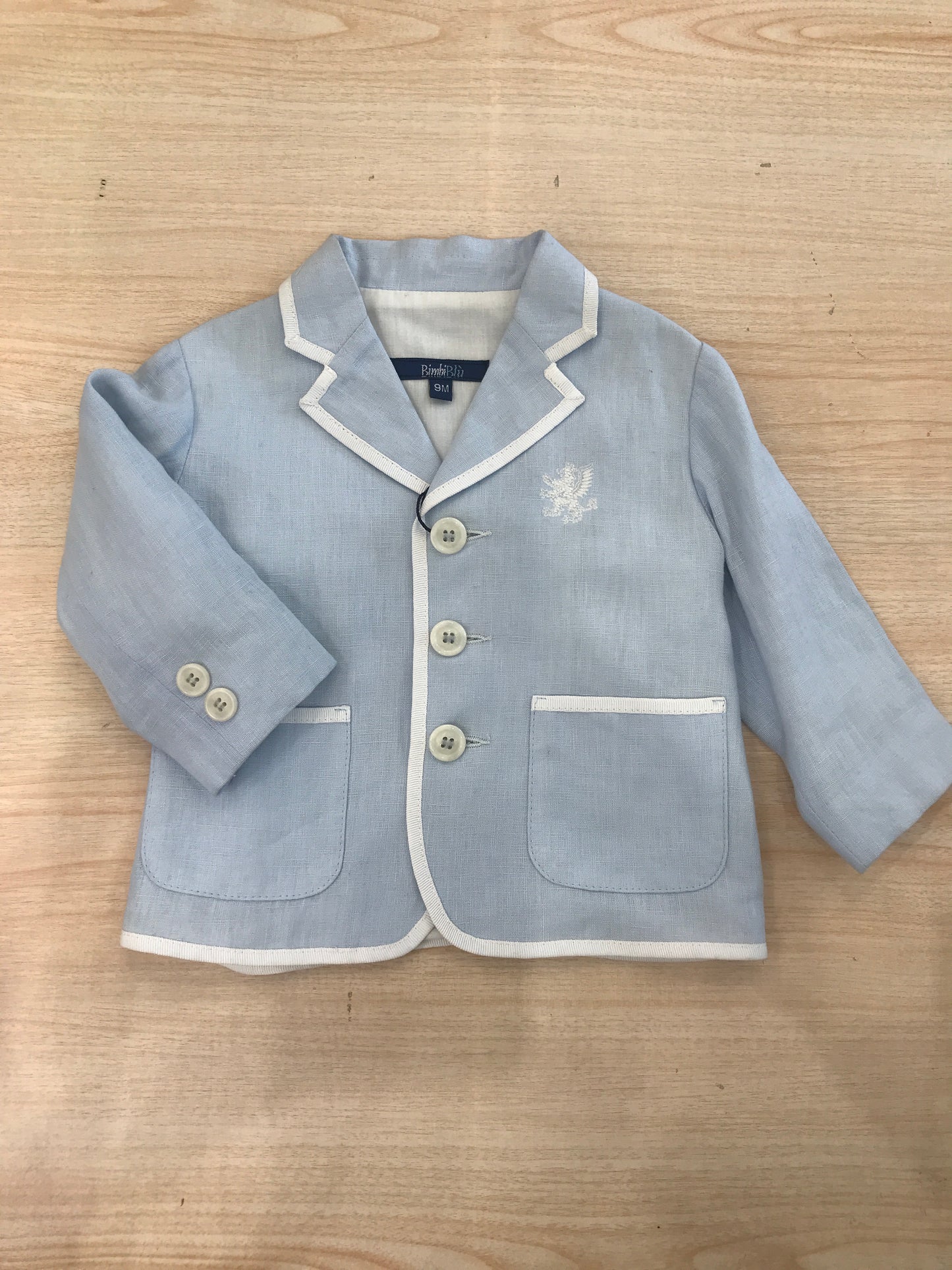 Giacca Bimbi Blu manica lunga celeste con profilo bianco con tasche e bottoncino