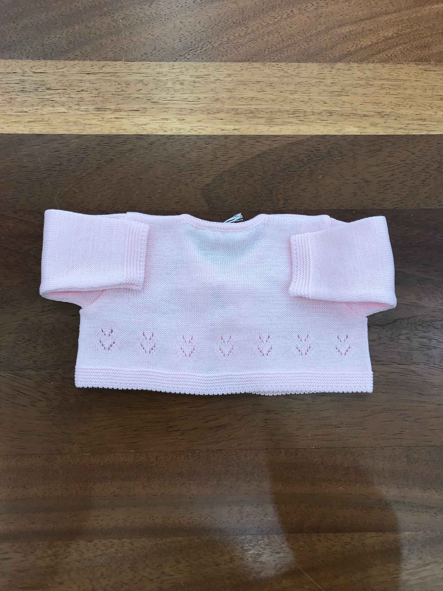 Cardigan Baby Lord in filo rosa manica lunga con fiocco e lavorazione sul davanti