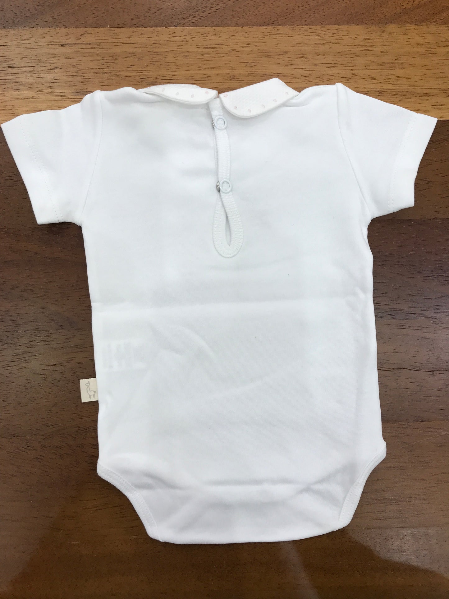 Body Baby Gi in cotone con collo con profilo con pois rosa mezza manica