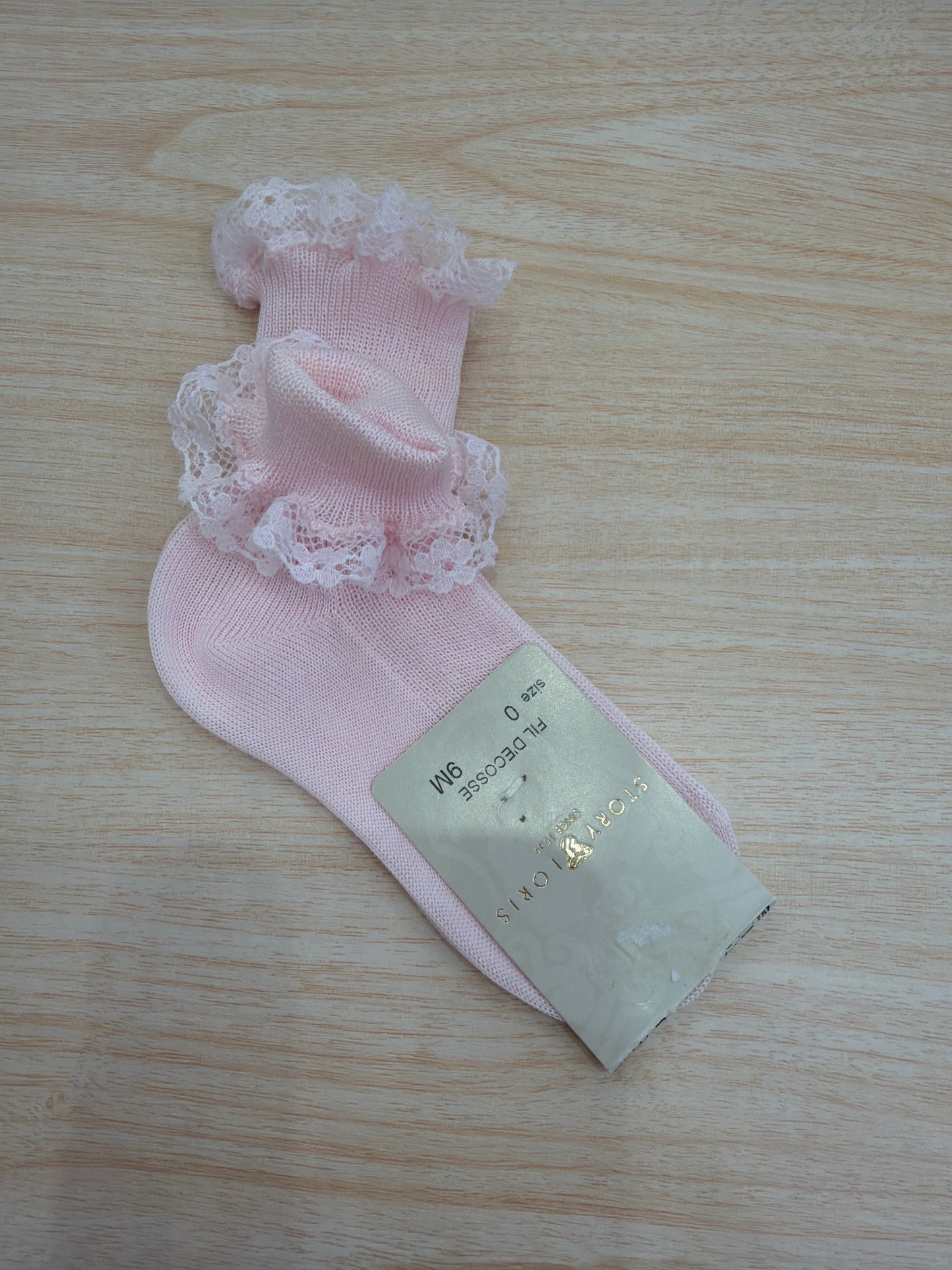Calzino Story Loris in filo rosa con rusche al bordo