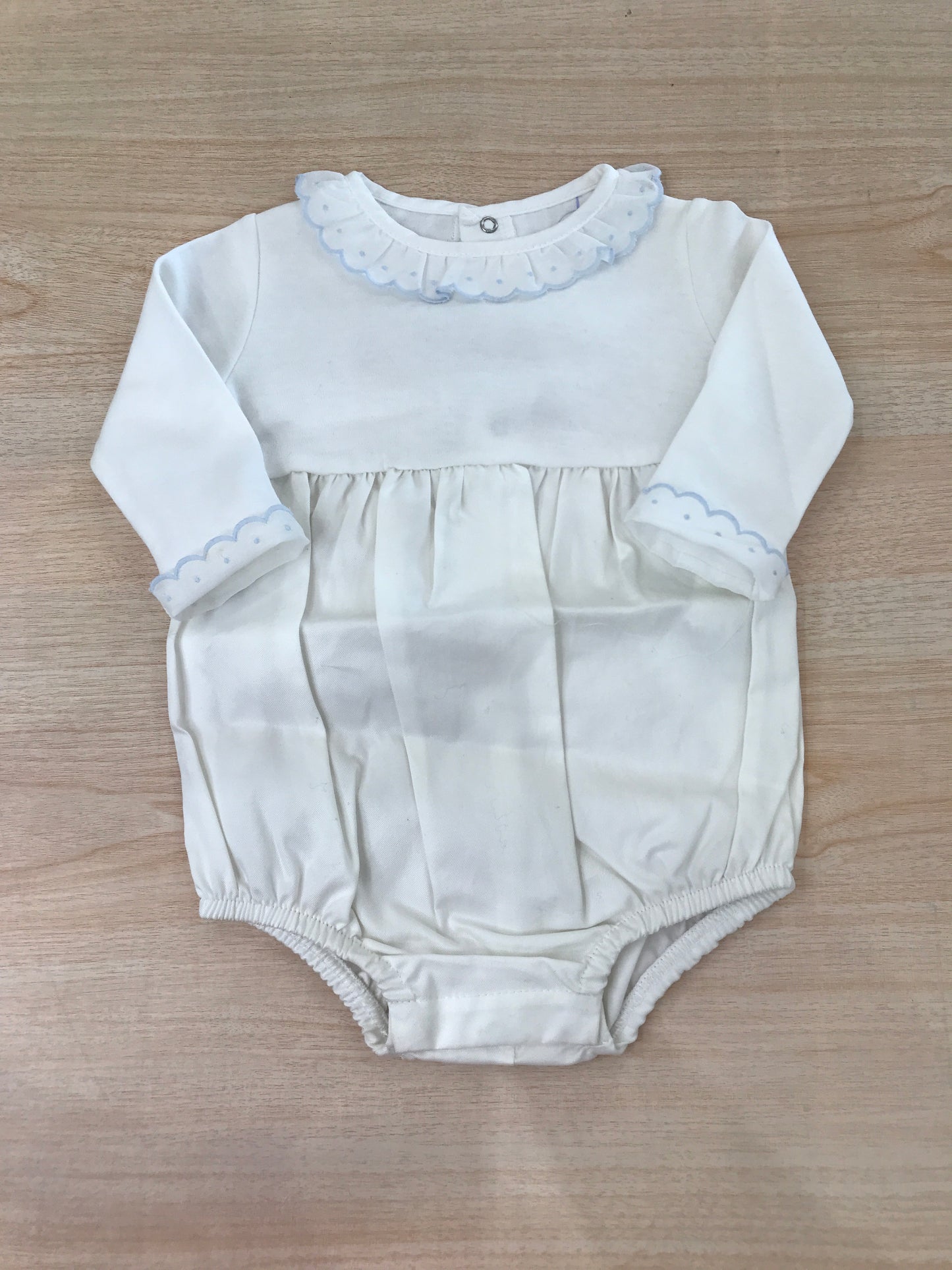 Body Laranjinha in cotone manica lunga con rusche al polsino con colletto con rusche rifinita in celeste