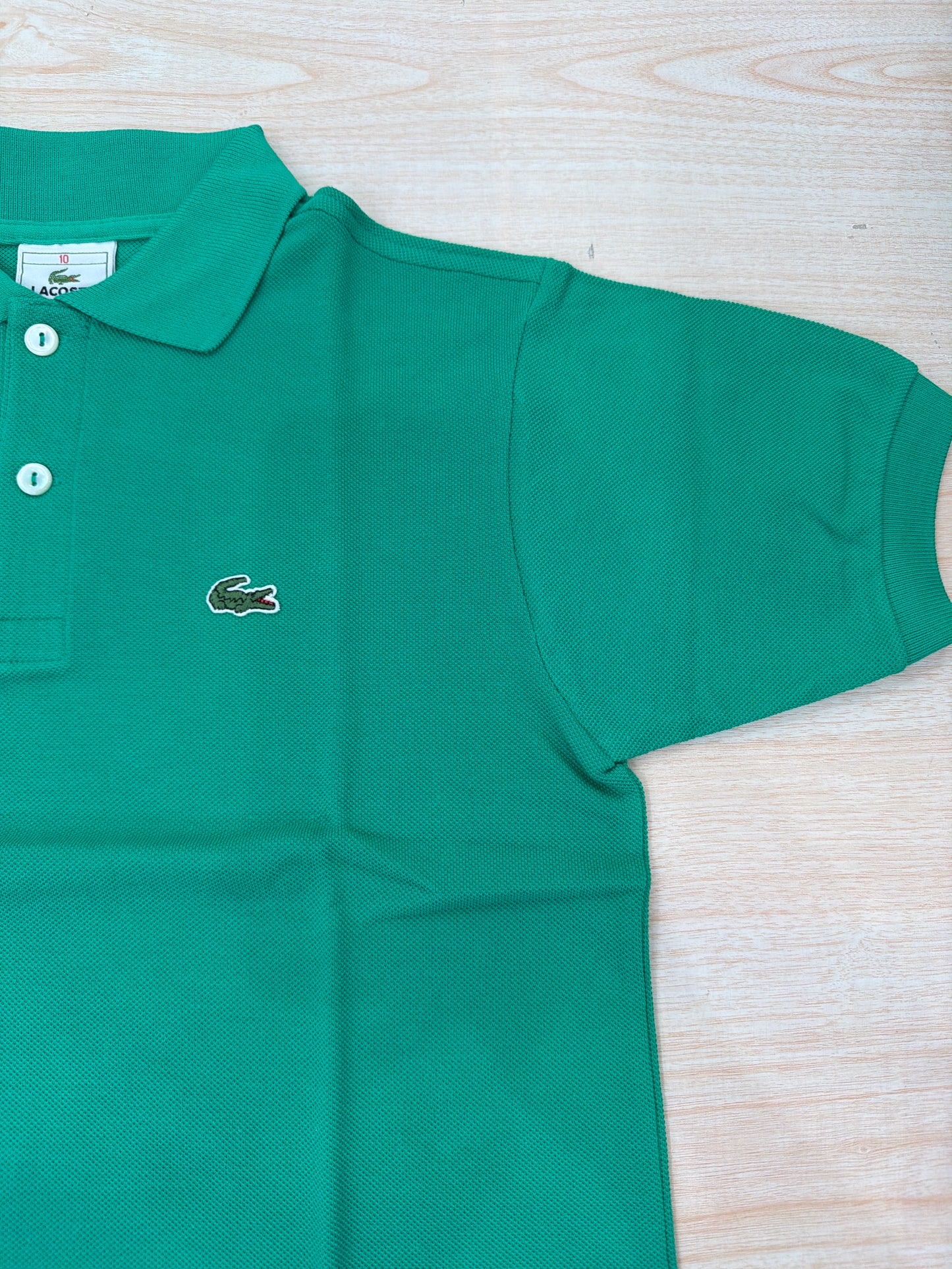 Polo Lacoste in cotone mezza manica con bottoncini e logo ricamato lateralmente unisex