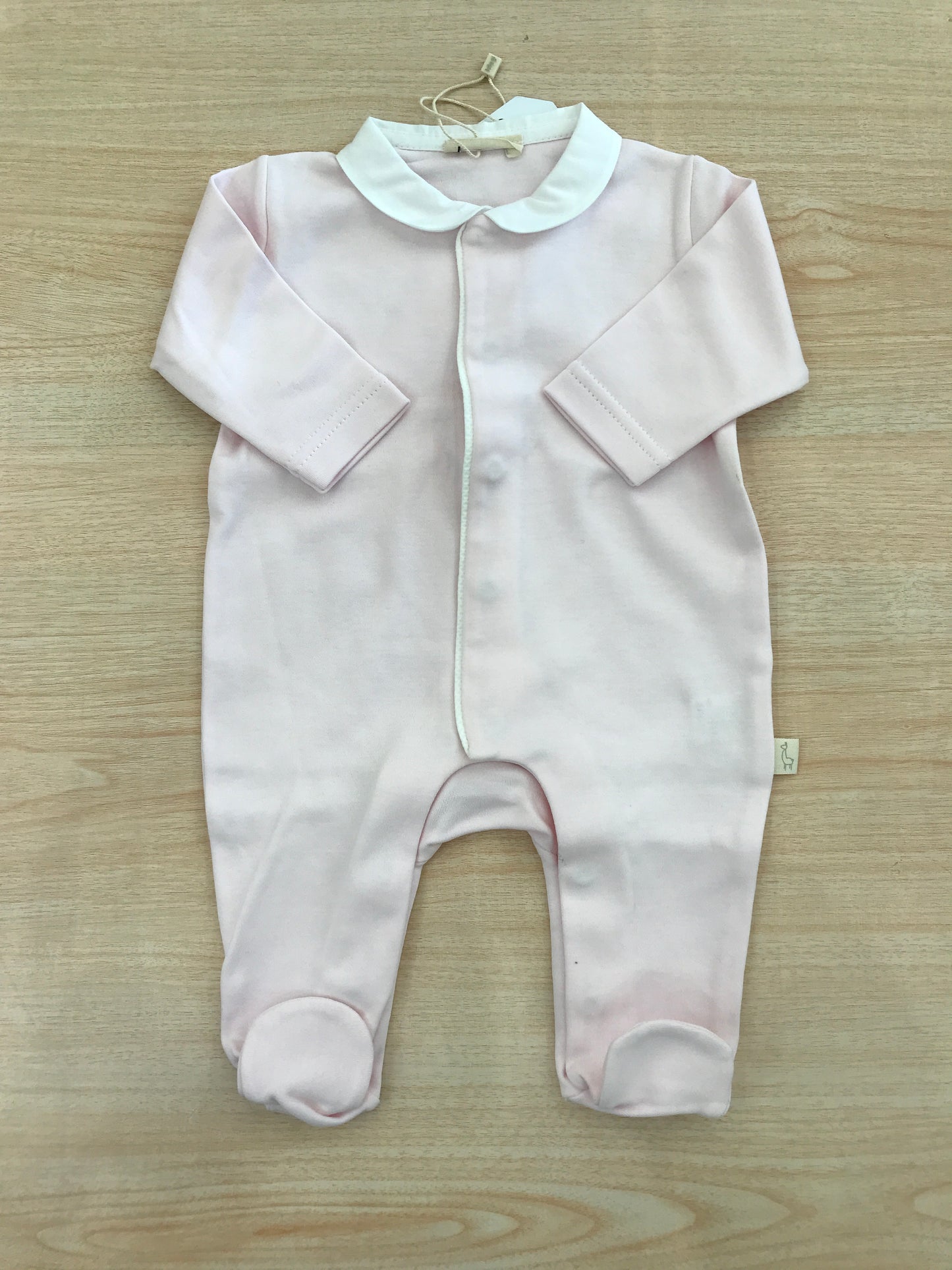 Tutina Baby Gi in cotone manica lunga gamba lunga con piedini con colletto bianco e sul retro ali bianche