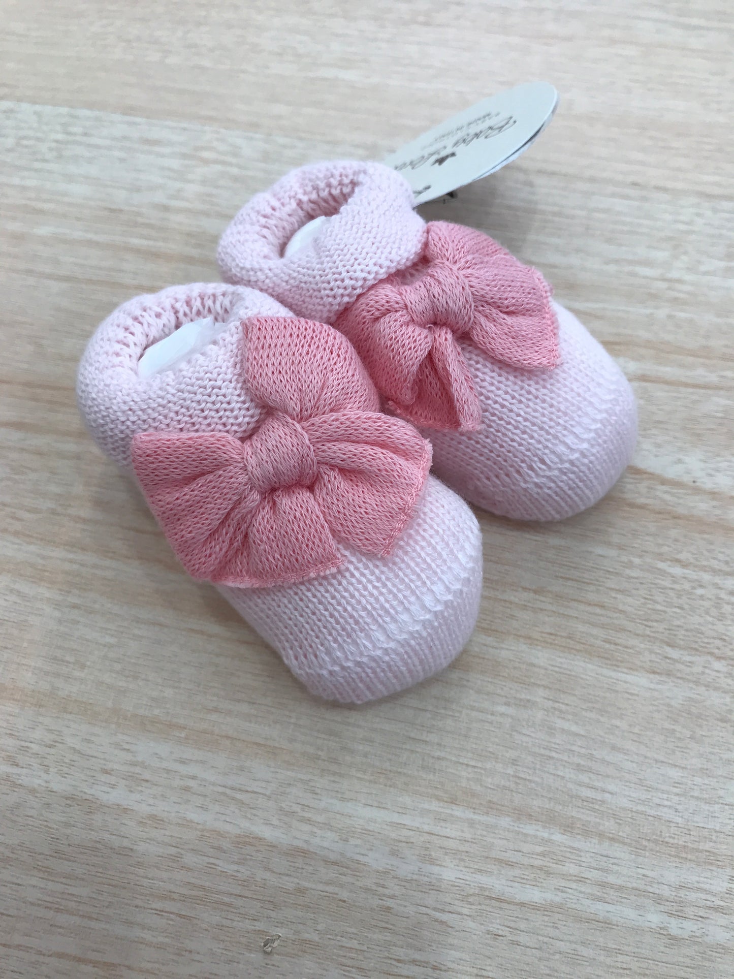 Babbucce Baby Lord in filo rosa con fiocco corallo sul davanti