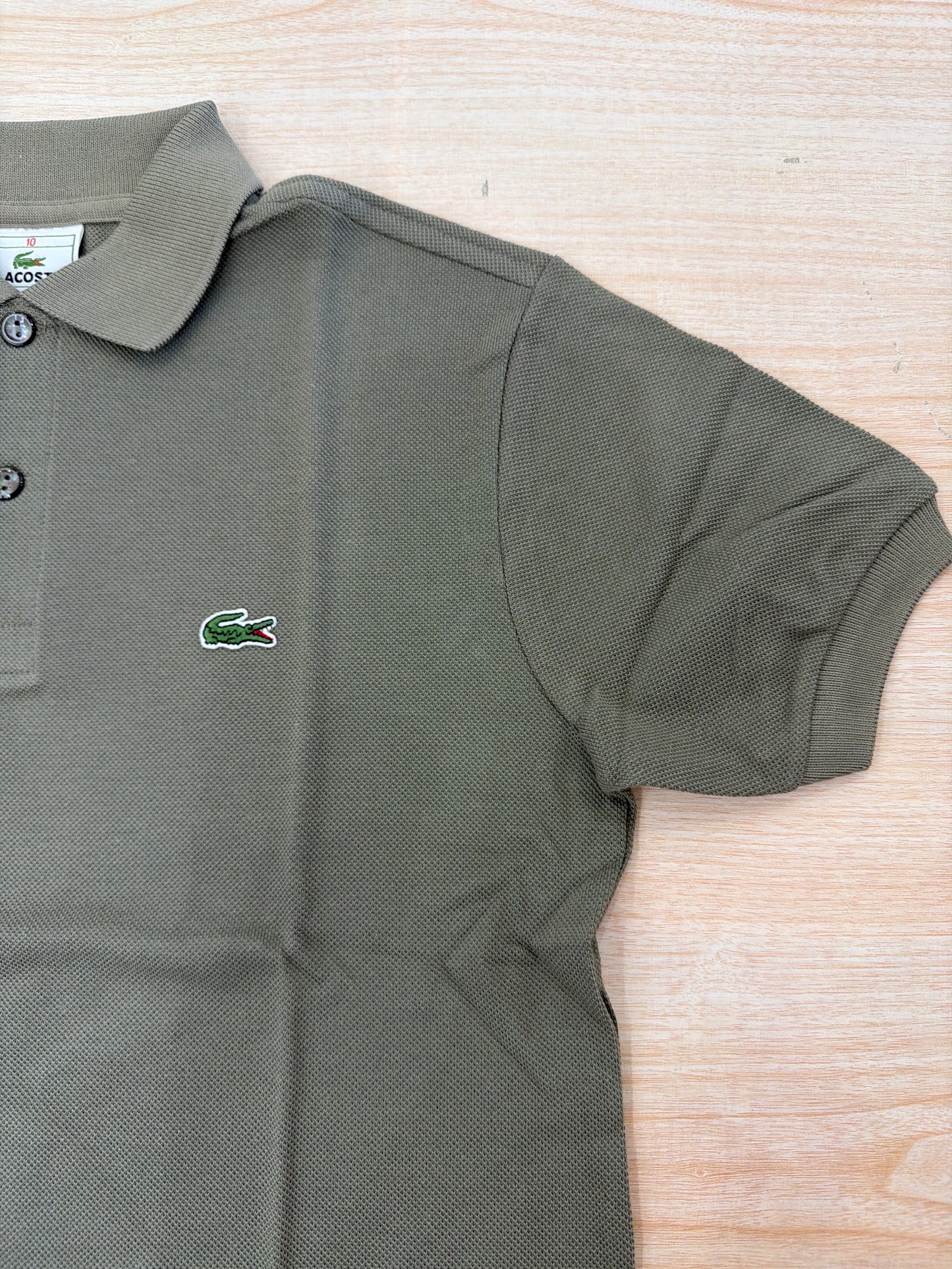 Polo Lacoste in cotone mezza manica con bottoncini e logo ricamato lateralmente unisex