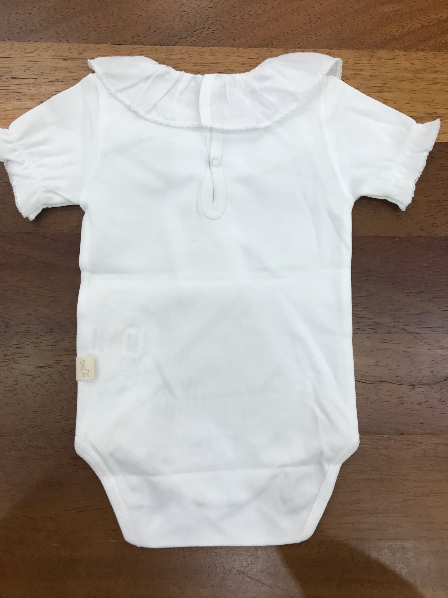 Body Baby Gi in cotone mezza manica con collo con rusche e bordo ricamato