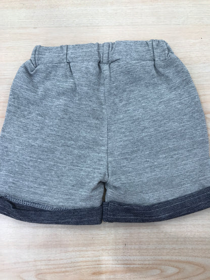 Pantalone Nanan corto in cotone grigio con risvolto