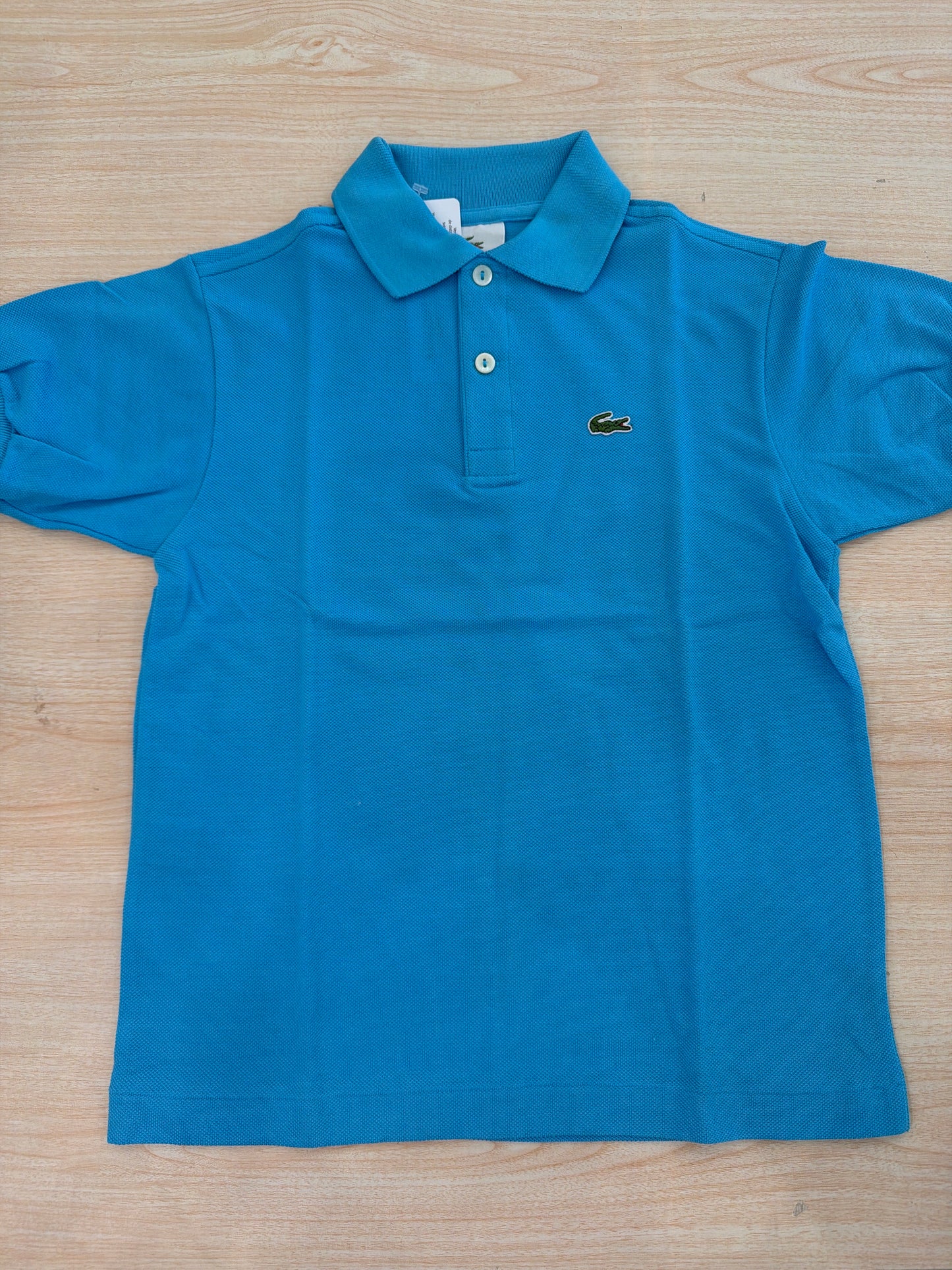 Polo Lacoste in cotone mezza manica con bottoncini e logo ricamato lateralmente unisex