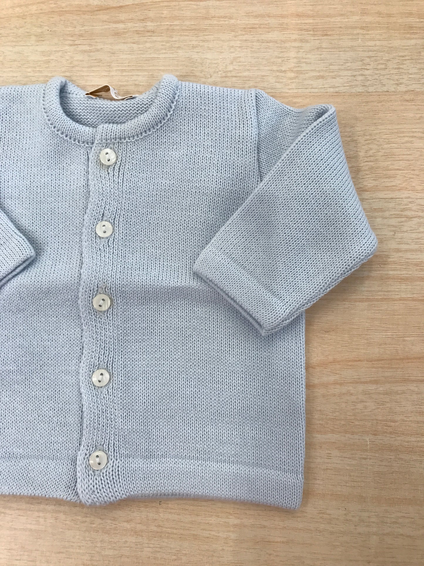 Cardigan Baby Lord in filo celeste con piccoli bottoncini