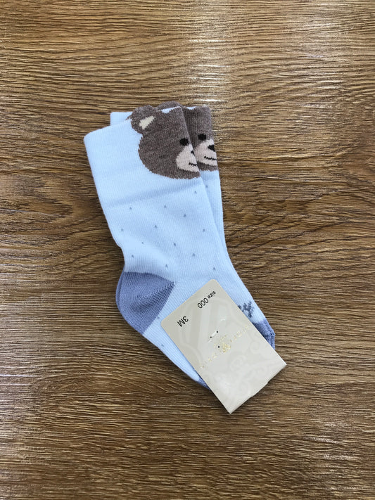Calzino Story Loris in caldo cotone celeste con piccoli pois ed orsetto