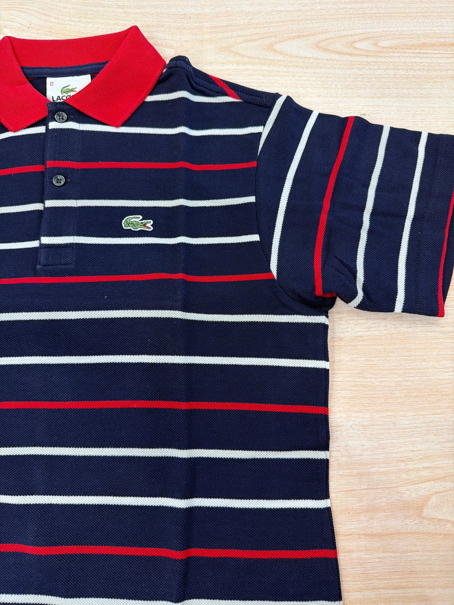 Polo Lacoste in cotone mezza manica con bottoncini e logo ricamato lateralmente unisex
