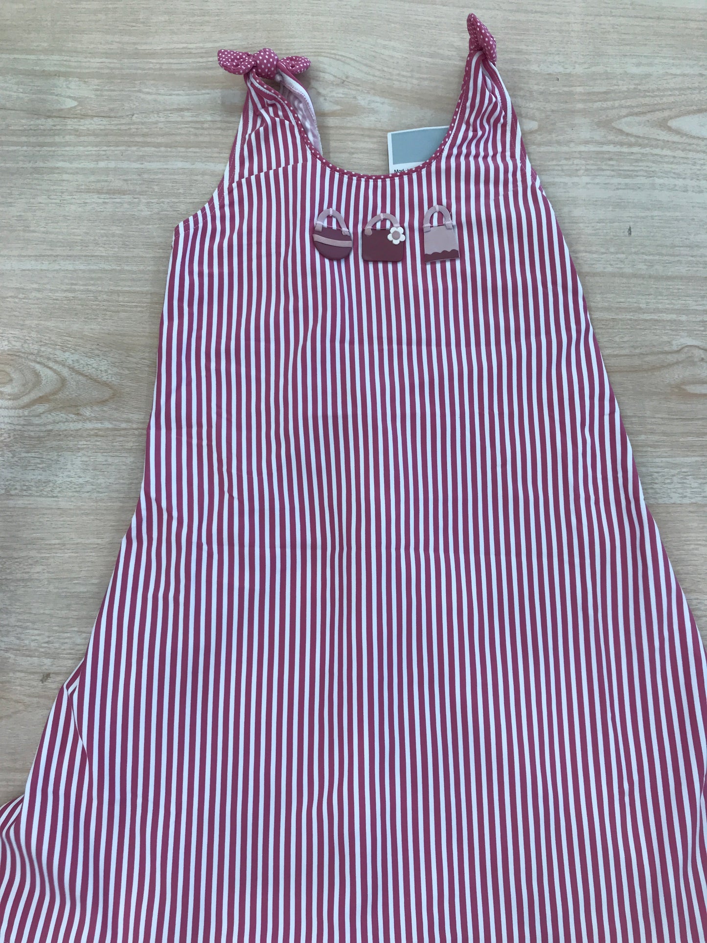 Copricostume Al Agua Patos a righe bianche e fucsia  bretelle con fiocchetti