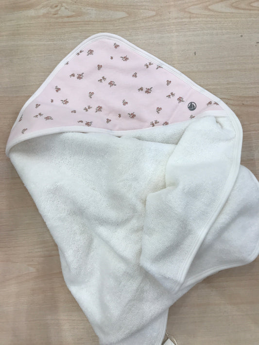 Telo Bagnetto Petit Bateau in spugna con triangolo rosa con fiorellini