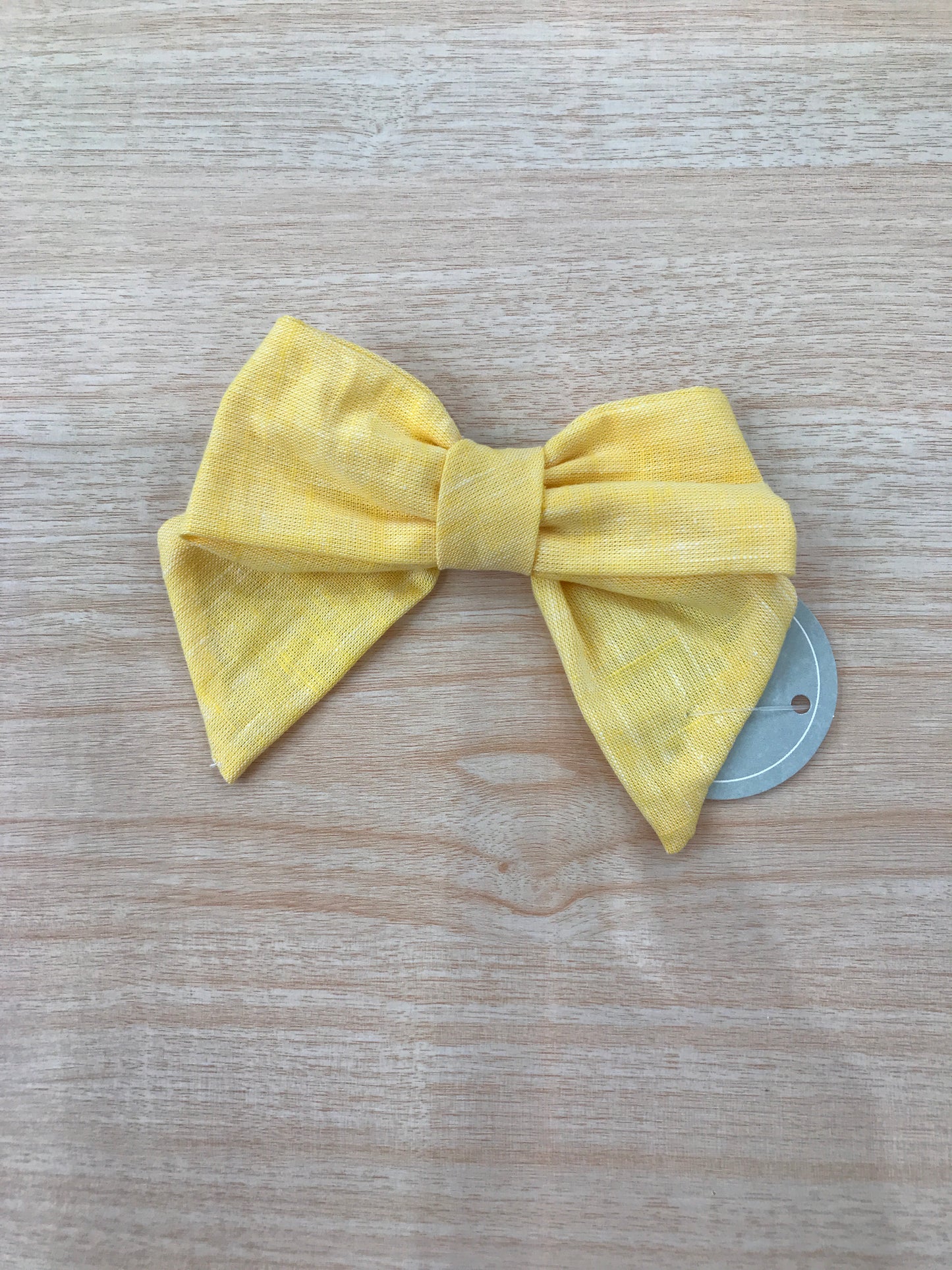 Fermaglio Belan in cotone fiocchetto giallo