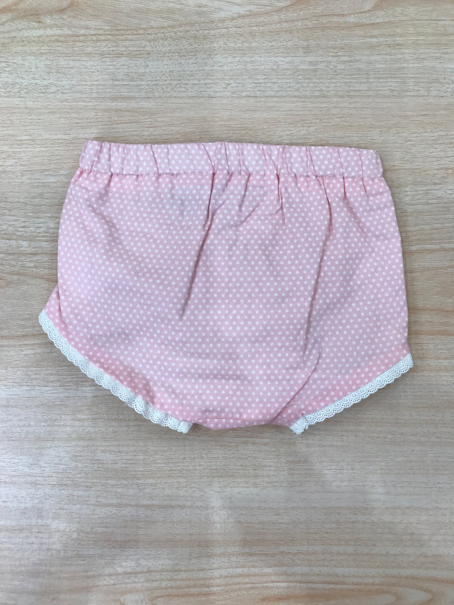 Culotte Laranjinha in cotone rosa con san gallo bianco sul davanti