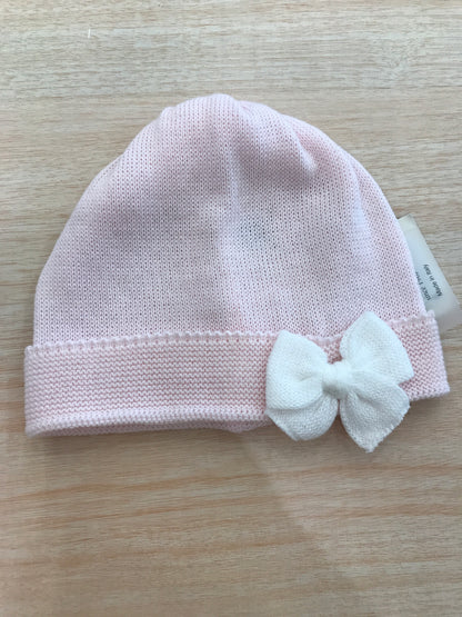 Cappello Baby Lord in filo rosa con risvolto con fiocco bianco