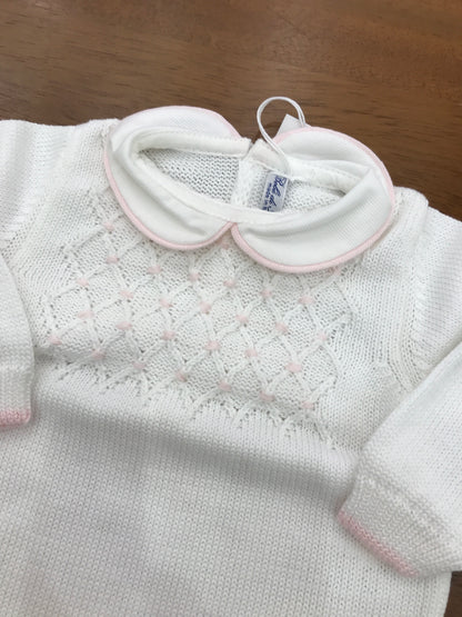 Tutina Bebè di Almy in filo con lavorazione di punto smock rosa con rifiniture in rosa