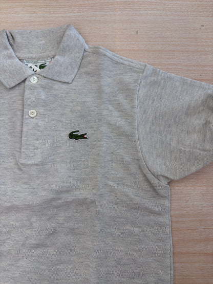 Polo Lacoste in cotone mezza manica con bottoncini e logo ricamato lateralmente unisex
