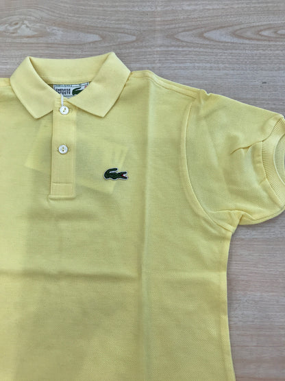 Polo Lacoste in cotone mezza manica con bottoncini e logo ricamato lateralmente unisex