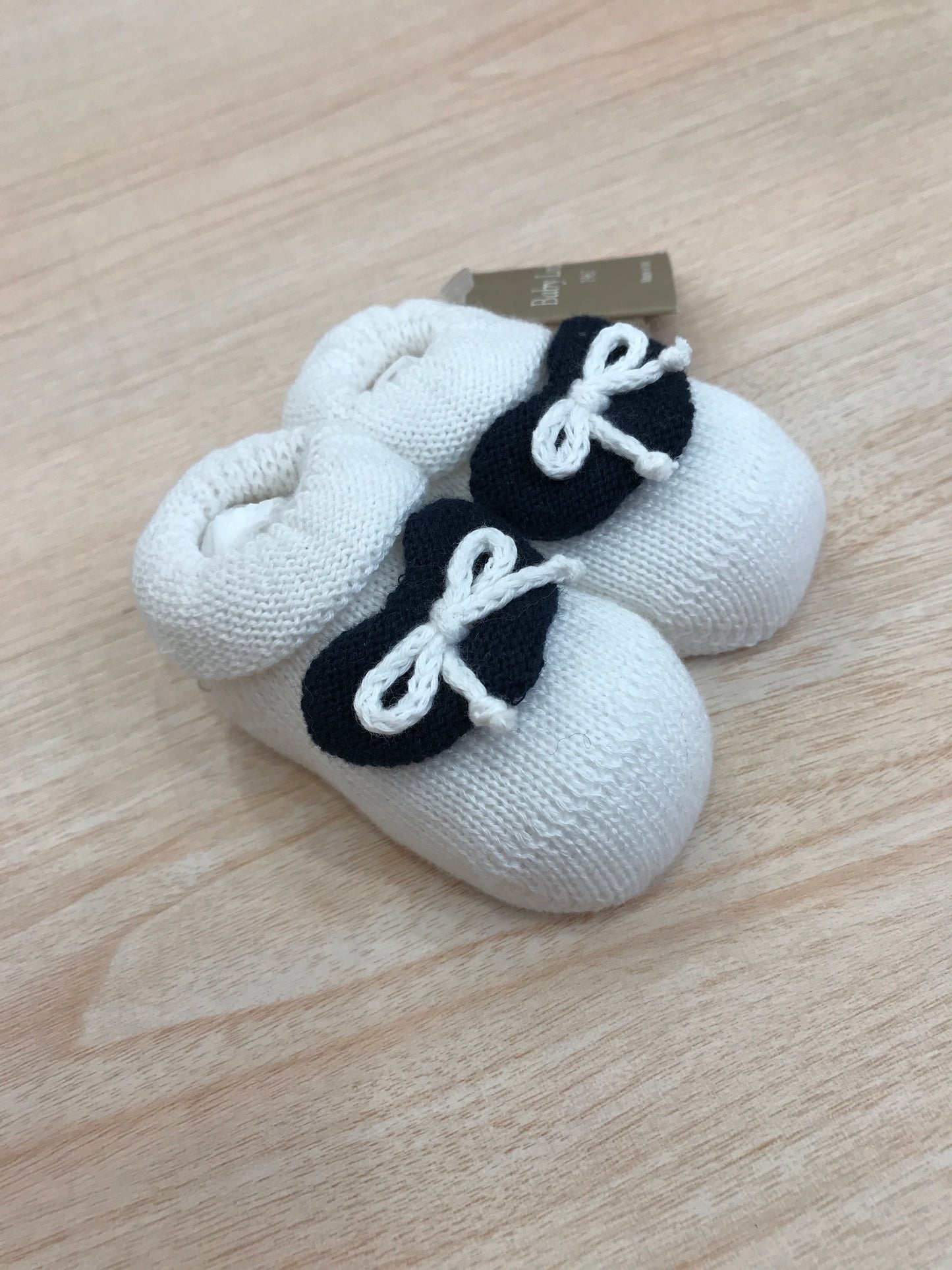 Babbucce Baby Lord in filo bianco con cuore blu scuro