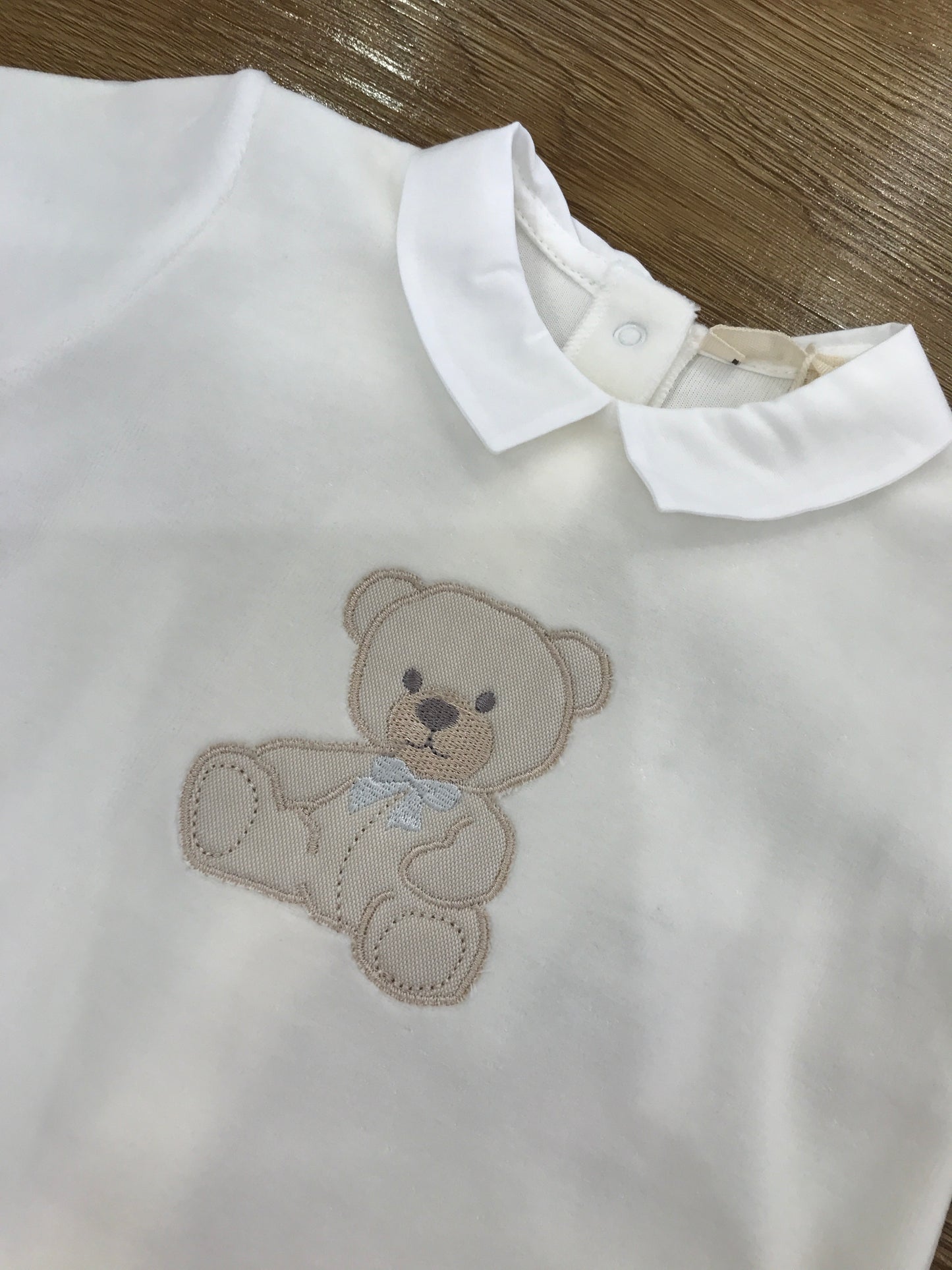 Tutina Baby Gi in ciniglia panna con orsetto centrale