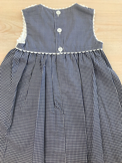 Abito Nicoletta Fanna in cotone a quadretti bianchi e blu con corpetto bianco con fiocco smanicato