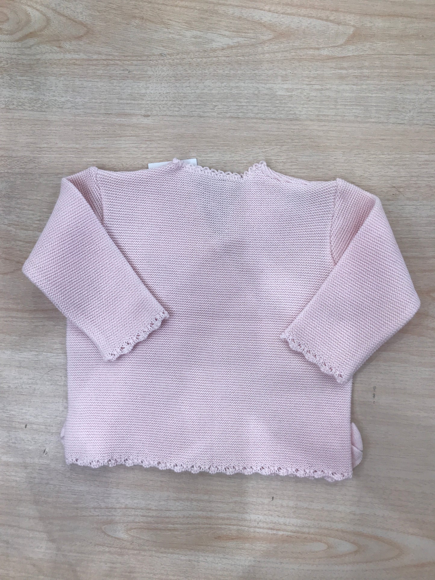 Cardigan Baby Lord in filo rosa chiusura ad incrocio con fiocchetti ai due lati