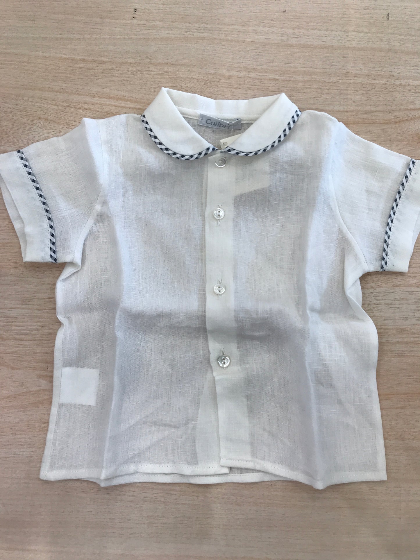 Camicia Colibrì in lino mezza manica con rifiniture a quadretti blu scuro