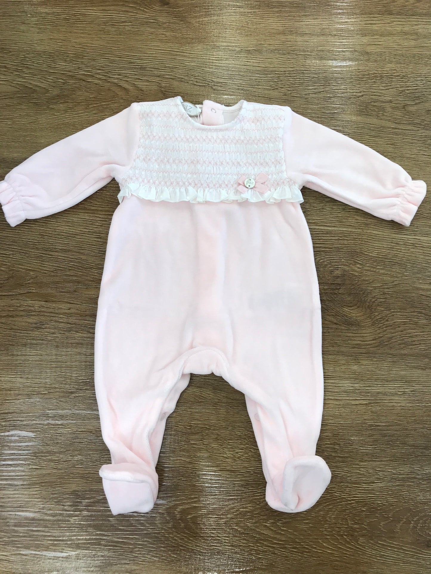 Tutina Paz Rodriguez in ciniglia rosa intera con corpetto lavorato da punto smock rosa e bianco