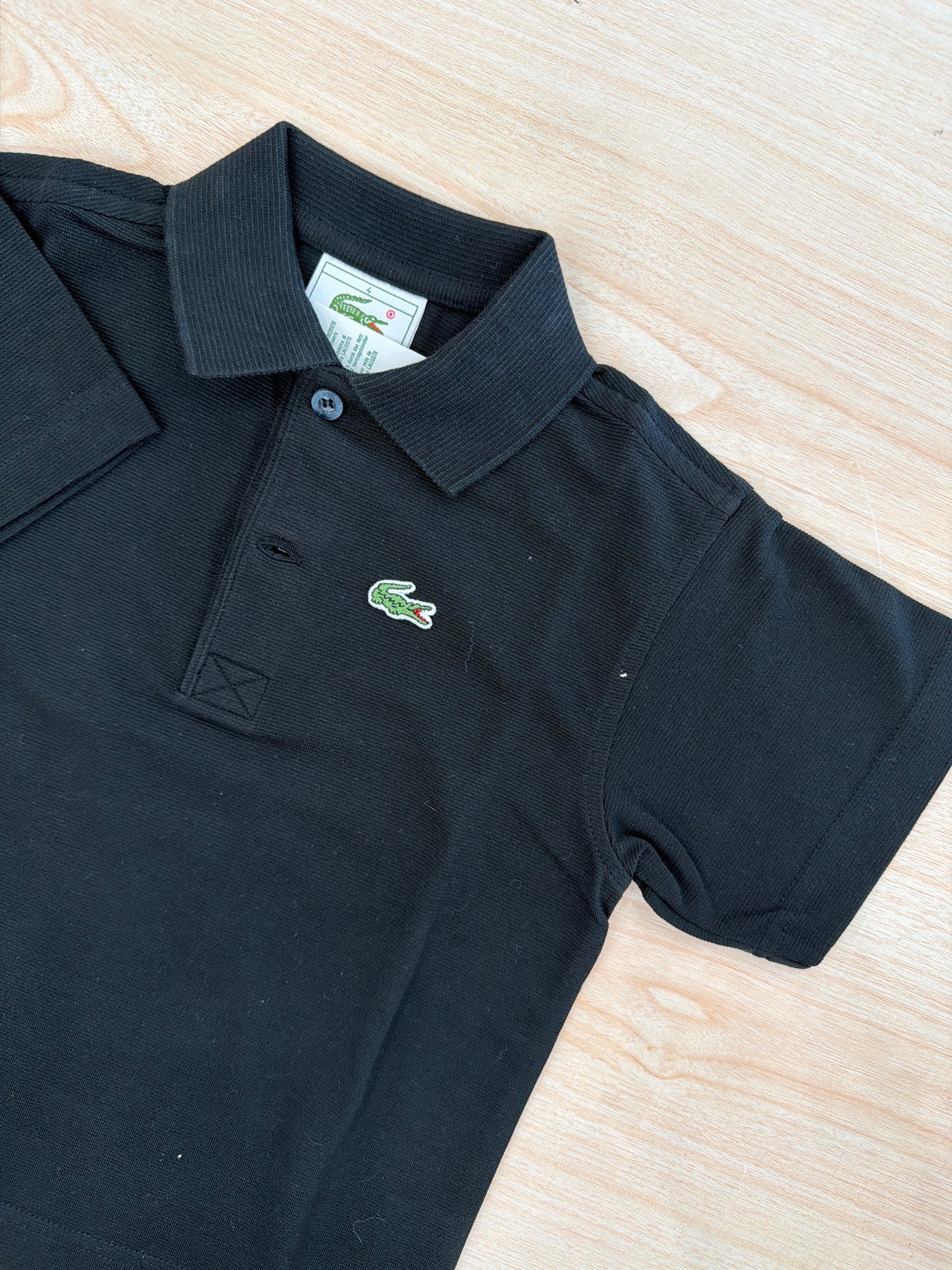 Polo Lacoste in cotone mezza manica con bottoncini e logo ricamato lateralmente unisex
