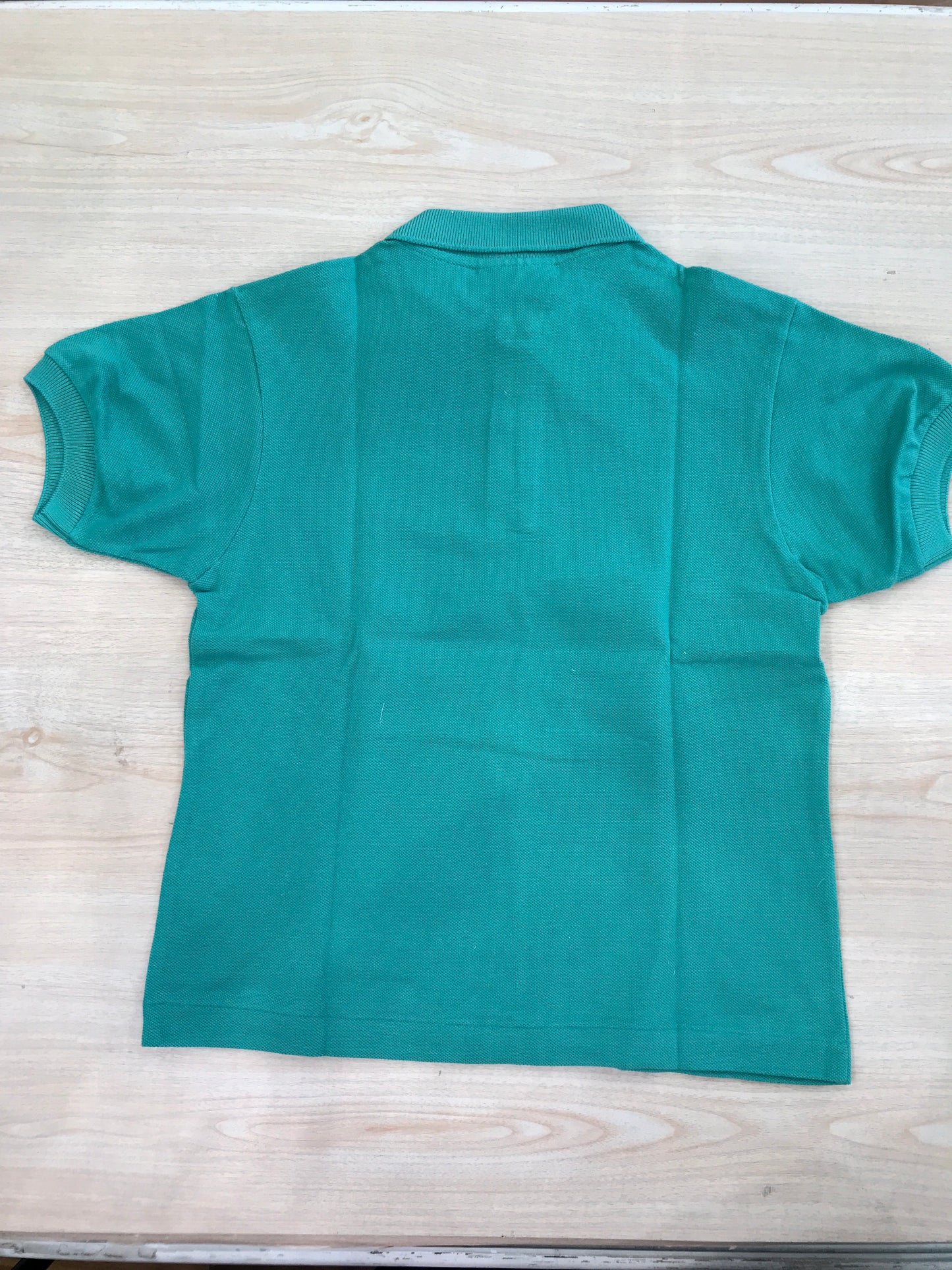 Polo Lacoste in cotone mezza manica con bottoncini e logo ricamato lateralmente unisex