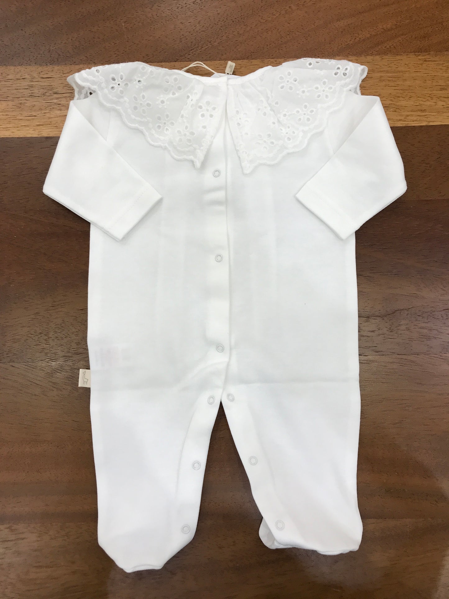 Tutina Baby Gi in cotone panna manica lunga gamba lunga con collo con rusche in san gallo